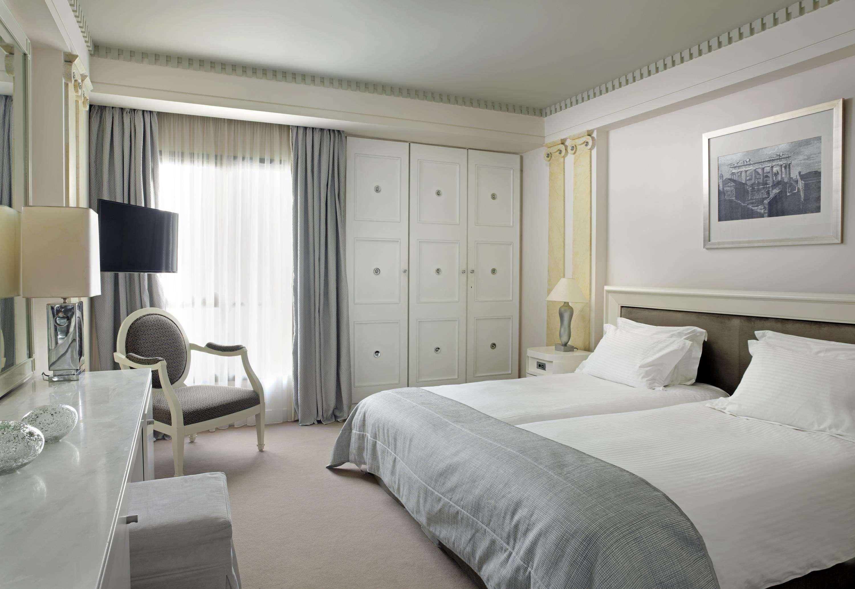 Hotel Njv Athens Plaza Pokoj fotografie A room at the Hotel de la Paix