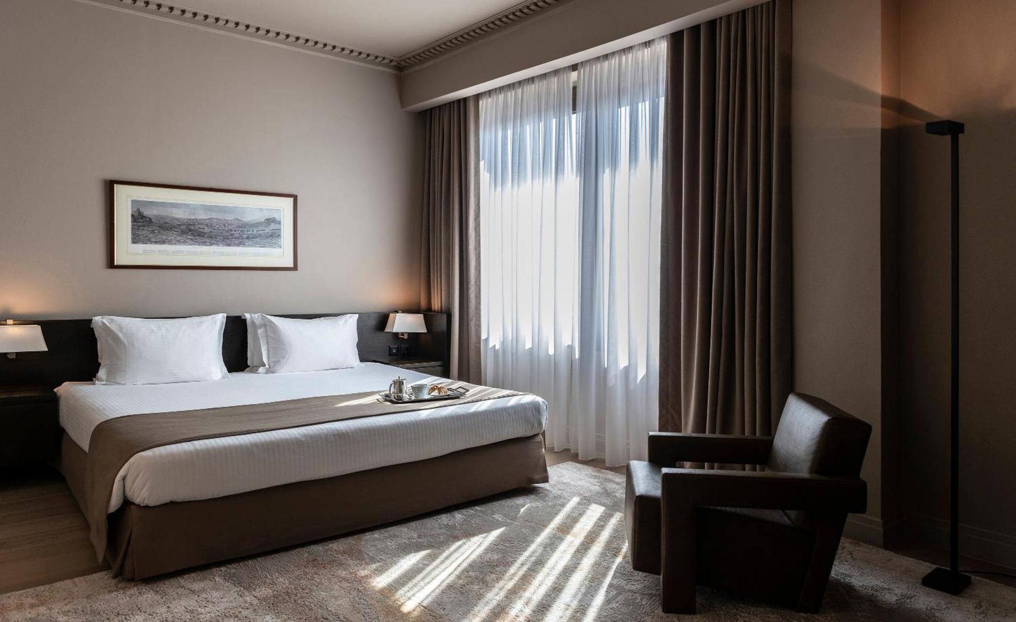 Hotel Njv Athens Plaza Exteriér fotografie A room at the hotel